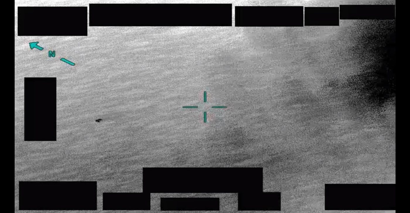 Image taken from the official infrared video showing a contrast zone above a body of water — exhibit DOW-UAP-PR115, 2019